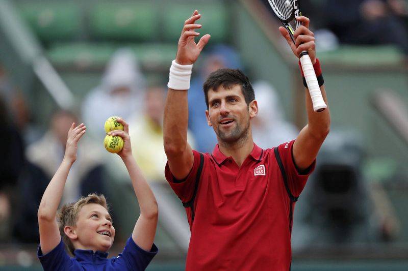 © Reuters. Tennis - French Open Mens Singles Quarterfinal match - Roland Garros - Novak Djokovic of Serbia vs Tomas Berdych of the Czech Republic
