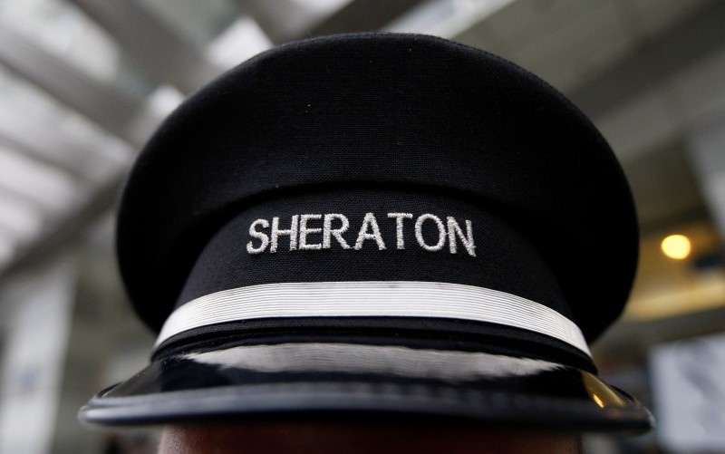 © Reuters. A doorman's hat at Sheraton hotel, a brand of Starwood Hotels & Resorts Worldwide, is pictured in Warsaw
