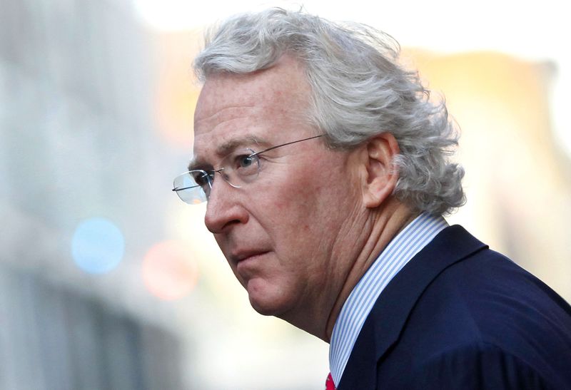 © Reuters. File photo of CEO, Chairman, and Co-founder of Chesapeake Energy Corporation McClendon walks through the French Quarter in New Orleans, Louisiana