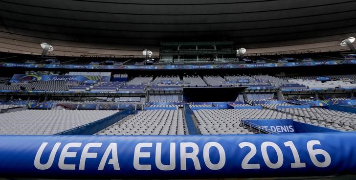 © Reuters. A huge banner of the Eiffel Tower is seen at the Stade de France in Saint-Denis before the start of the UEFA 2016 European Championship in Paris