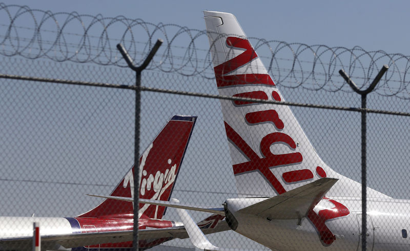 © Reuters. File photo of Virgin planes parked next to each other at Kingsford Smith airport in Sydney