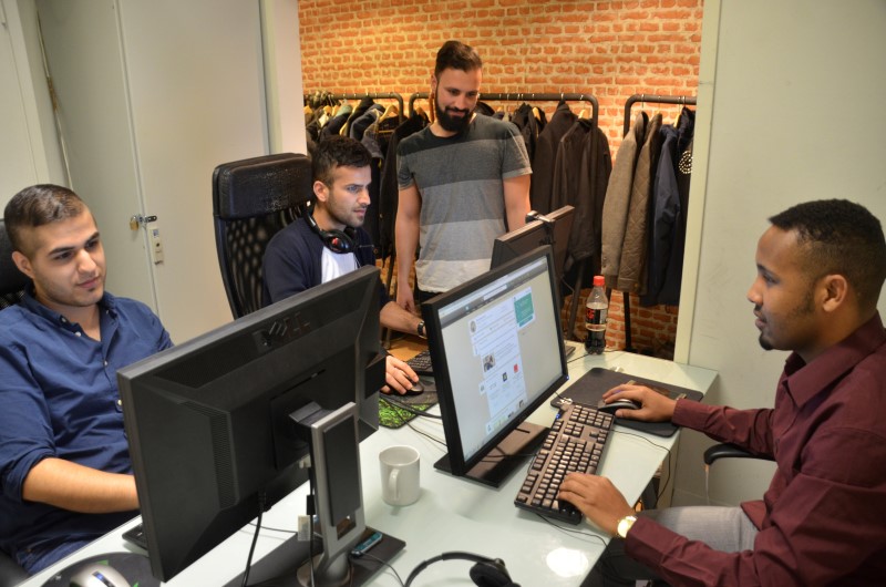 © Reuters. Taha, Jawad, Integrify CEO Rahman and Amin work at startup Integrify’s office in Helsinki