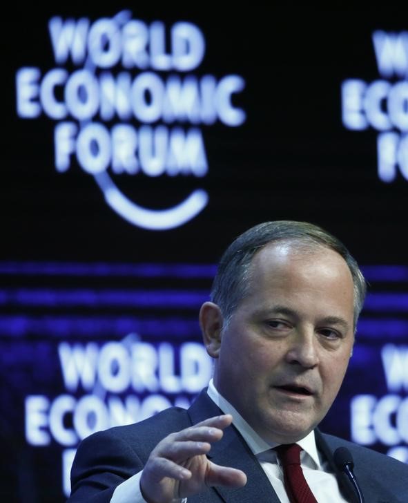 © Reuters. Coeure, member of the Executive Board of the European Central Bank (ECB), gestures during the session 'The Global Economic Outlook' in the Swiss mountain resort of Davos