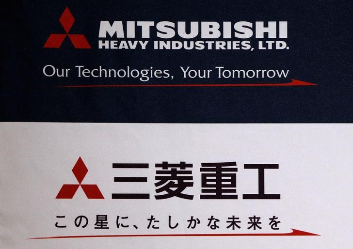 © Reuters. The logo of Mitsubishi Heavy Industries is seen at the company's news conference in Tokyo