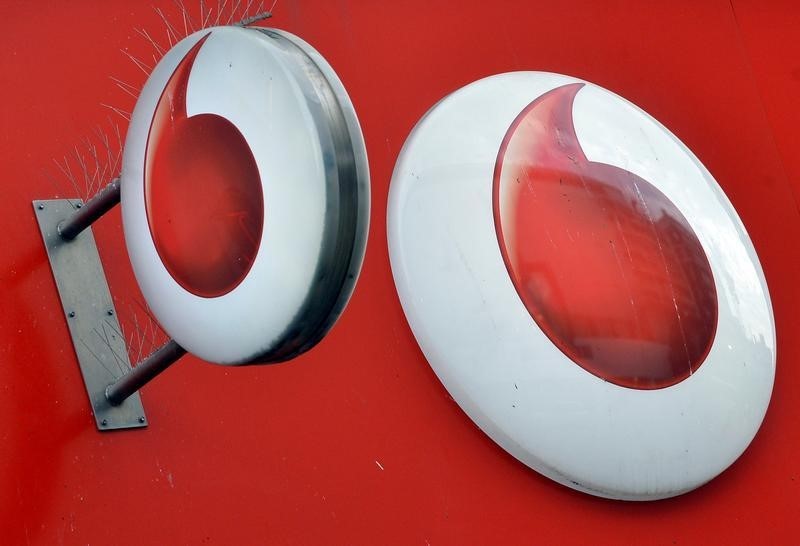 © Reuters. Vodafone branding is seen outside a retail store in London