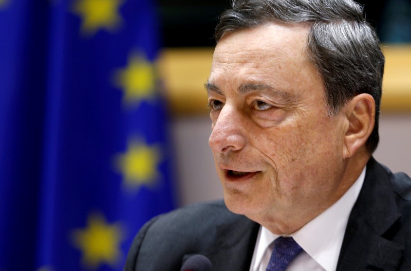 © Reuters. ECB President Draghi addresses EU Parliament's Economic and Monetary Affairs Committee in Brussels