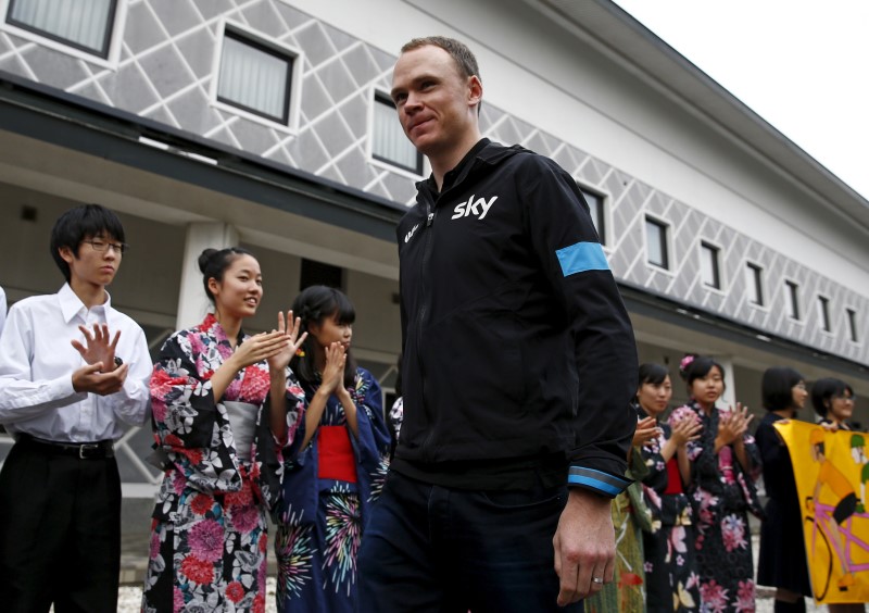 © Reuters. Team Sky rider Chris Froome of Britain arrives for a media event at the Umiya Budokan arts centre in Saitama, outside Tokyo