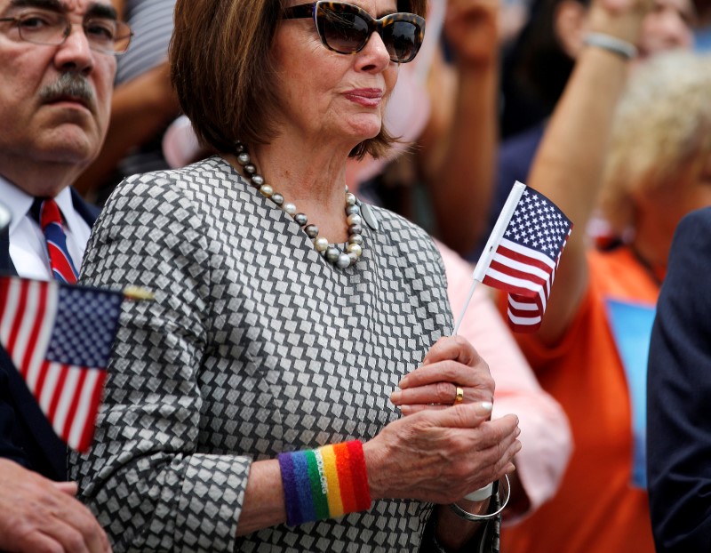 © Reuters. U.S. House Minority Leader Nancy Pelosi wears a rainbow armband as she attends a news conference accompanied by members of the House Democratic Caucus to call on House Speaker Paul Ryan to allow a vote on gun violence prevention legislation in Capitol Hil