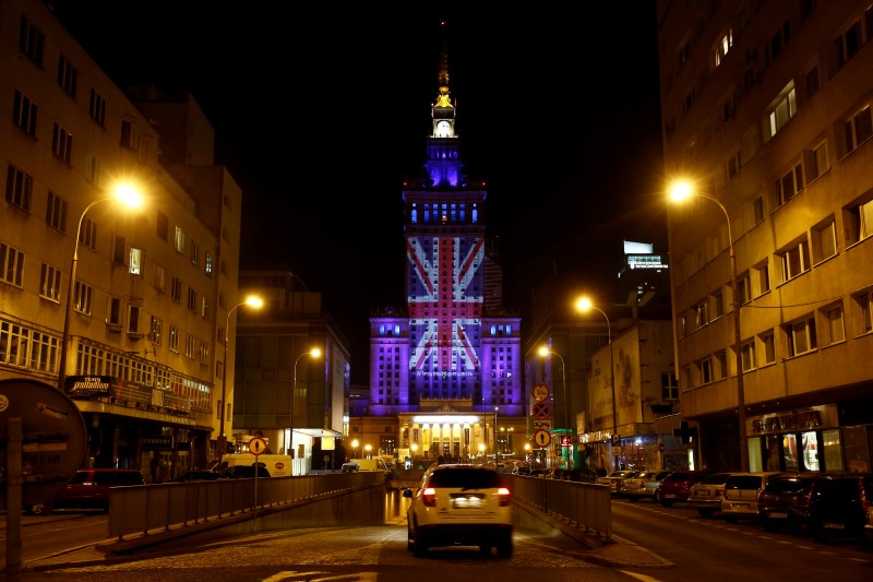 © Reuters. The Palace of Culture and Science is illuminated in Union Jack colours by Warsaw's capital authorities in support of Britain staying in the EU, in Warsaw