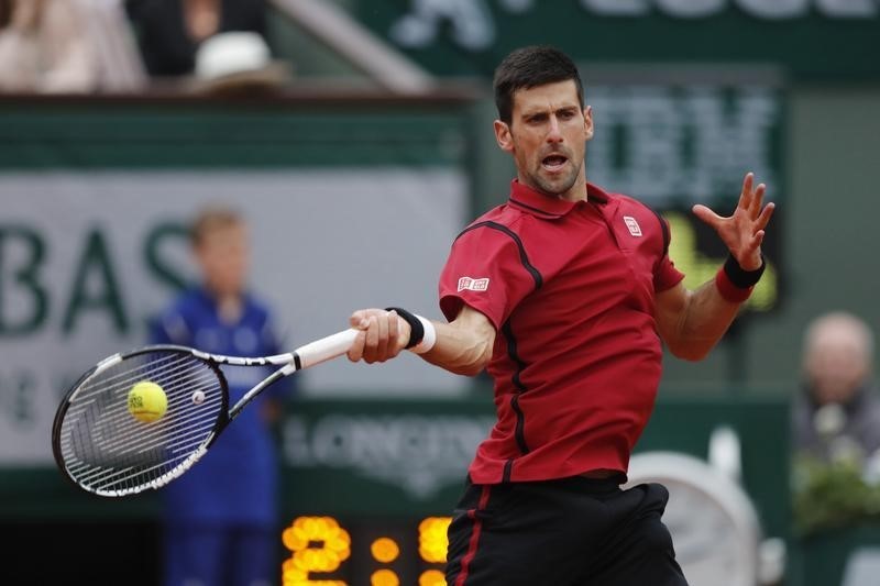 © Reuters. Djokovic debutará en Wimbledon contra el británico Ward