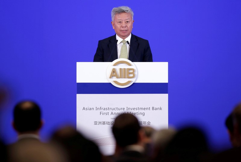 © Reuters. AIIB president Jin Liqun attends the opening ceremony of the first annual meeting of AIIB in Beijing