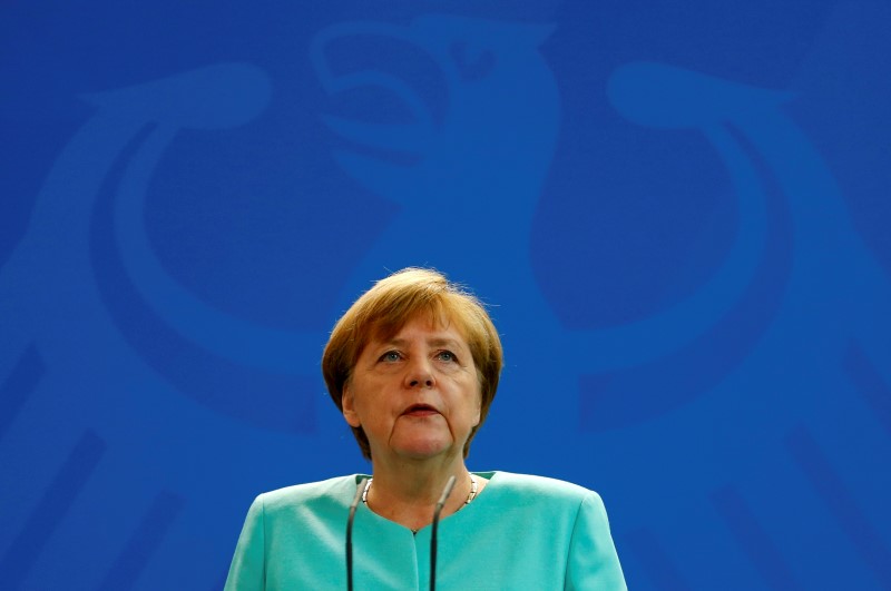 © Reuters. German Chancellor Merkel gives a statement in Berlin