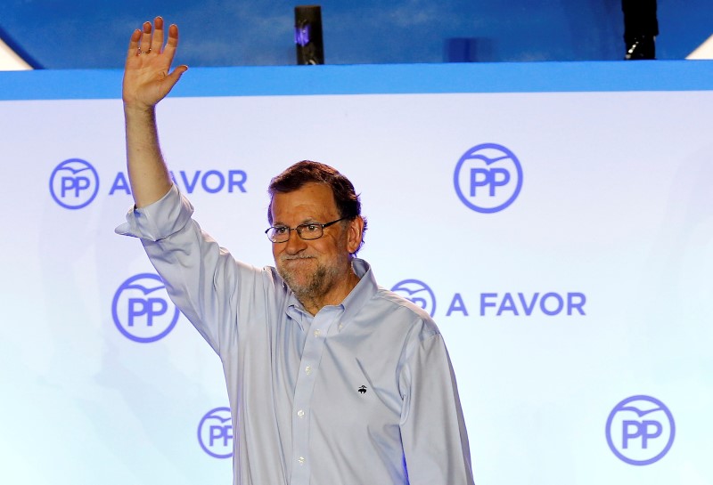 © Reuters. Primeiro-ministro interino da Espanha, Mariano Rajoy, durante evento em Madri