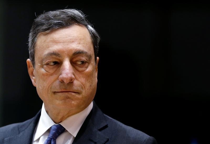 © Reuters. ECB President Draghi arrives to address the EU Parliament's Economic and Monetary Affairs Committee in Brussels