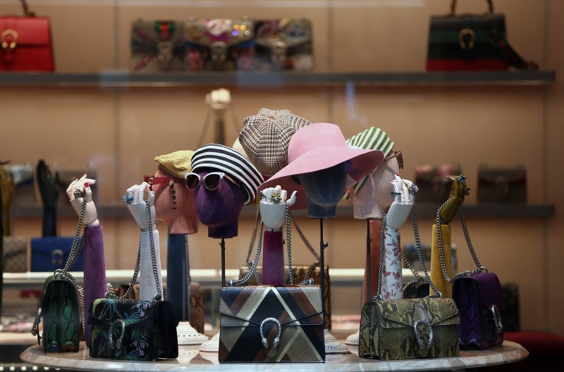 © Reuters. Gucci products are displayed in the window of a store on Old Bond Street in London