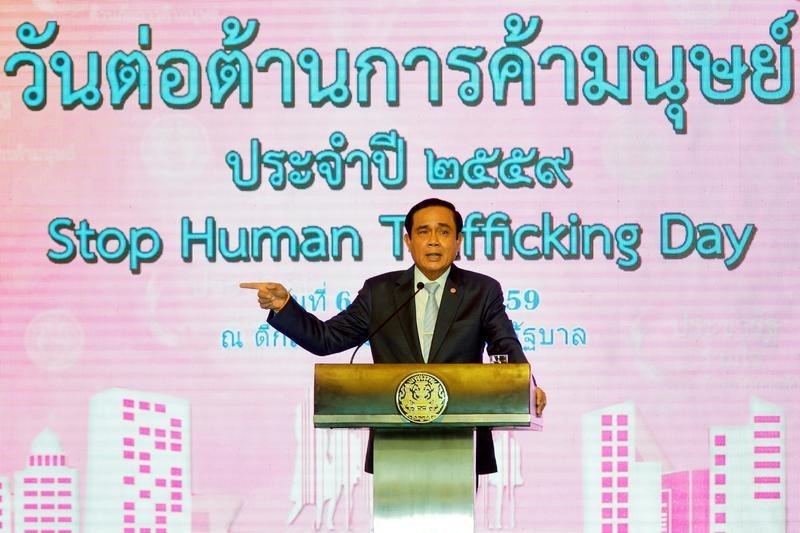 © Reuters. Thailand's Prime Minister Prayuth Chan-ocha speaks during the National Anti-Trafficking in Persons Day at the Government House in Bangkok