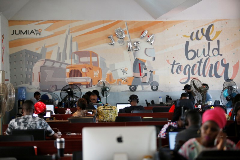 © Reuters. People work on computers at the online store Jumia in Ikeja district, in Lagos