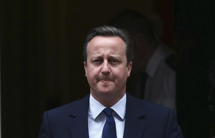 © Reuters. Britain's Prime Minister David Cameron leaves Number 10 Downing Street to attend Prime Minister's Questions at parliament in London