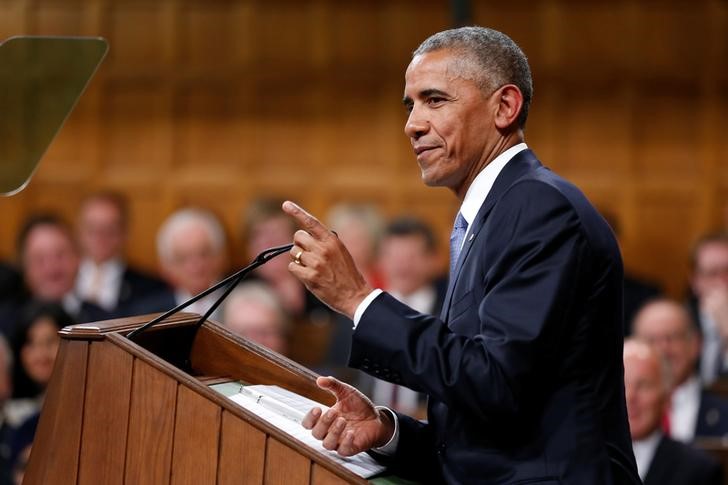 © Reuters. U.S. President Obama addresses Parliament in Ottawa