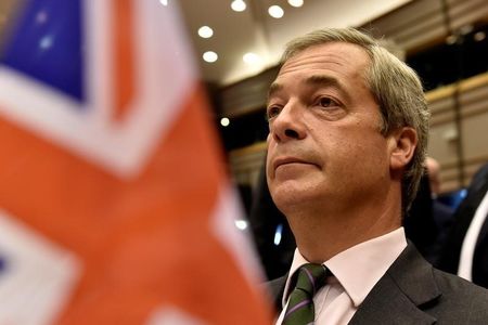 © Reuters. Farage, the leader of the UKIP, attends a plenary session at the European Parliament on the outcome of the 