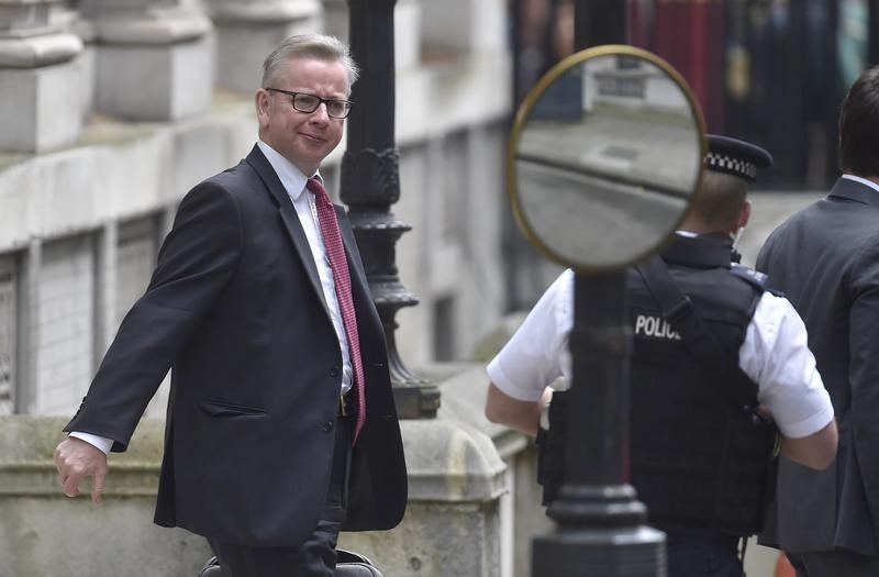 © Reuters. Britain's Justice Secretary, Michael Gove, leaves after a cabinet meeting in Downing Street in central London