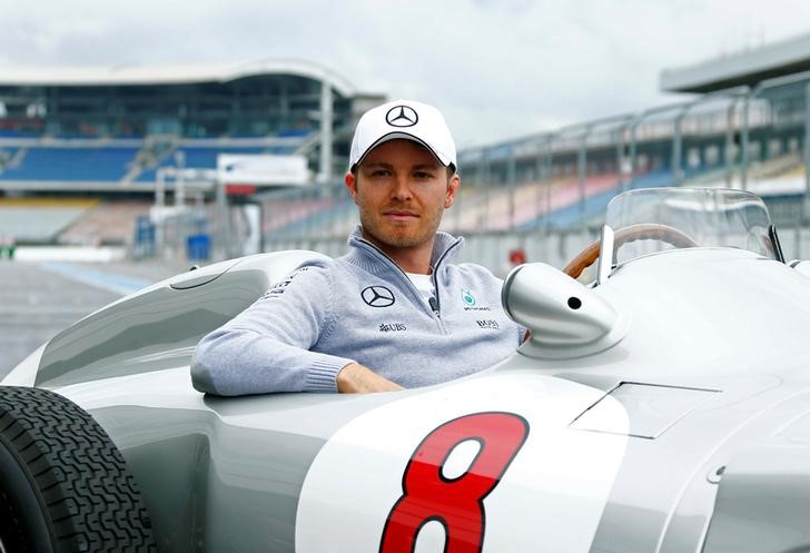 © Reuters. Mercedes Formula One driver Rosberg poses in a Mercedes W196 R during the Mercedes Benz media day at the Hockenheim racing circuit