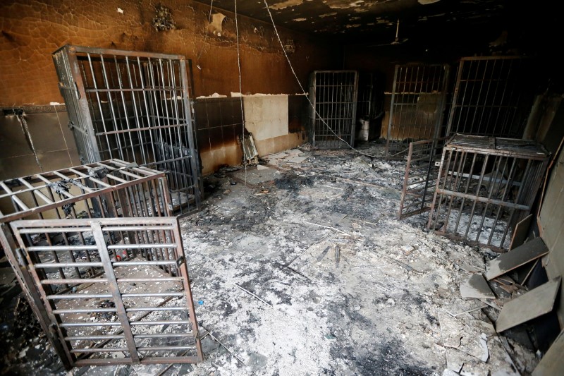 © Reuters. Burnt out prison cells belonging to Islamic State militants are seen in Falluja after government forces recaptured the city from Islamic State militants, Iraq