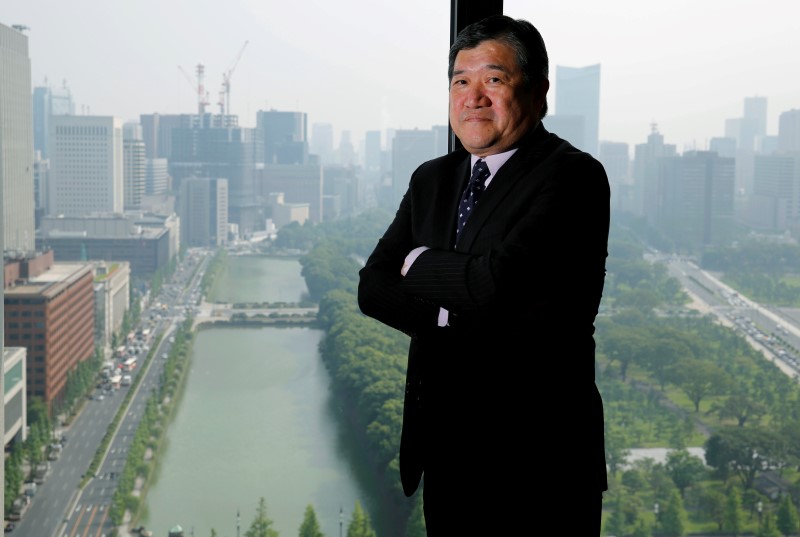 © Reuters. Japanese trading company Mitsui & Co's President and CEO Yasunaga poses for a photo after an interview with Reuters in Tokyo