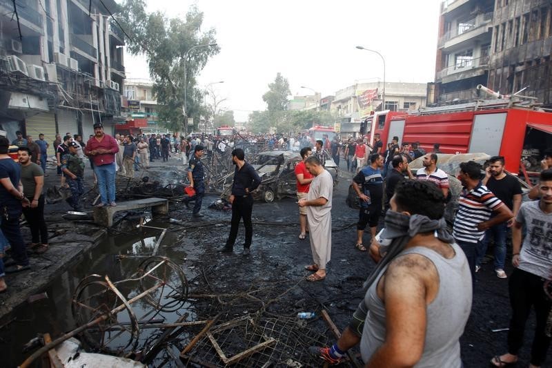 © Reuters. مقتل نحو 120 في تفجيرين ببغداد أعلن تنظيم الدولة الإسلامية مسؤوليته عنهما