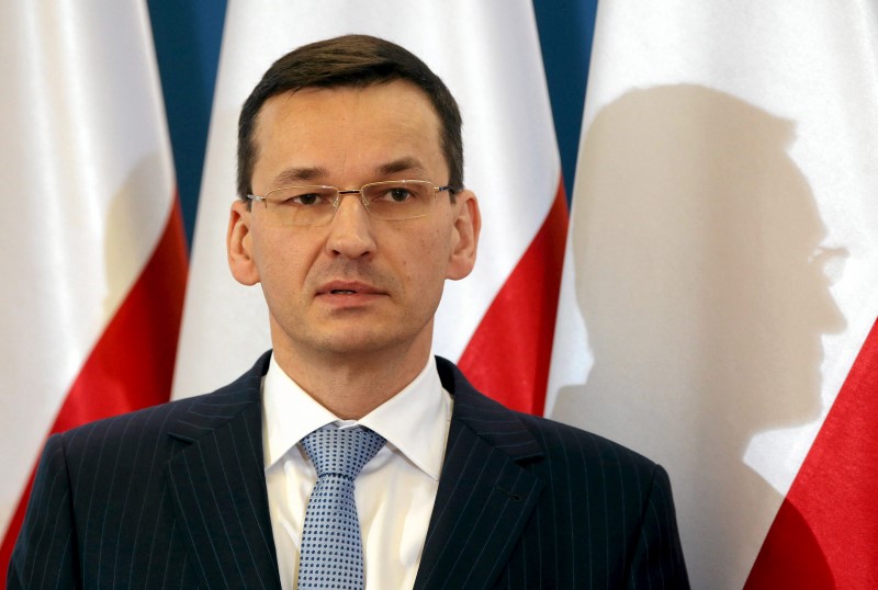 © Reuters. Deputy Prime Minister Mateusz Morawiecki speaks during news conference at the Prime Minister Chancellery in Warsaw