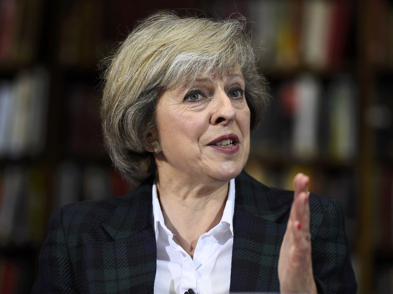 © Reuters. Britain's Home Secretary Theresa May attends a press conference in London