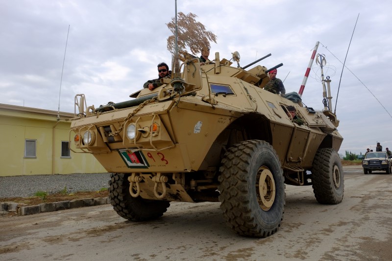 © Reuters. Afghan army troops in a Mobile Strike Force Vehicle return from a mission in Kunduz