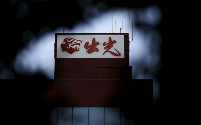 © Reuters. A signboard of Idemitsu Kosan Co is seen atop a building in Tokyo