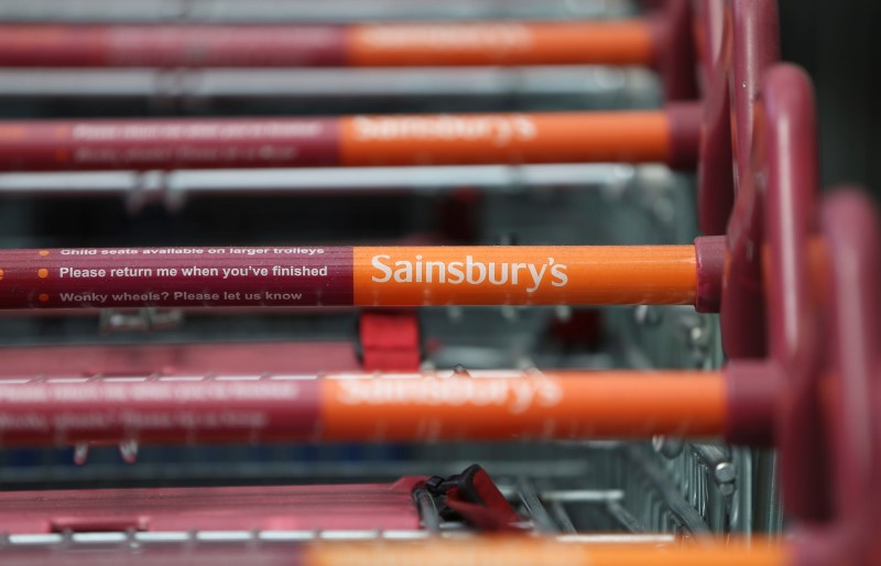 © Reuters. Shopping trolleys are seen at a Sainsbury's store in London