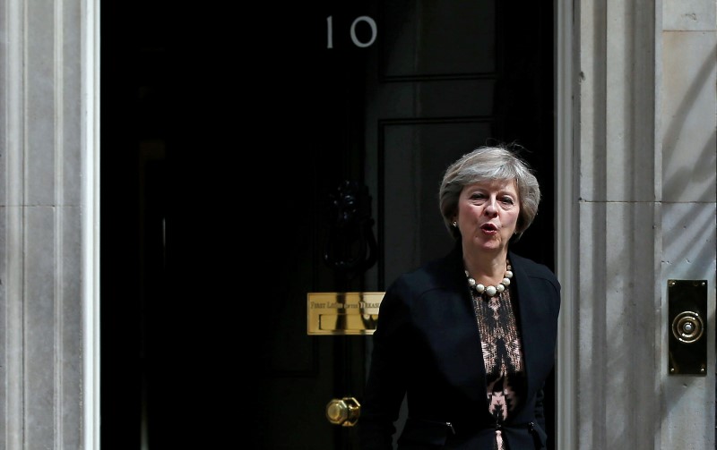 © Reuters. Theresa May deixa reunião em Londres