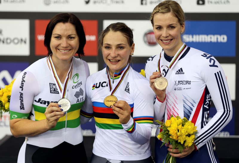 © Reuters. Winner Vogel of Germany second placed Meares of Australia and third placed James of Great Britain pose on the podium after the Women's Keirin final  at the UCI Track Cycling World Championships in London