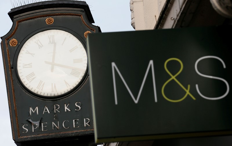 © Reuters. Marks & Spencer signs are seen outside outside a store in London