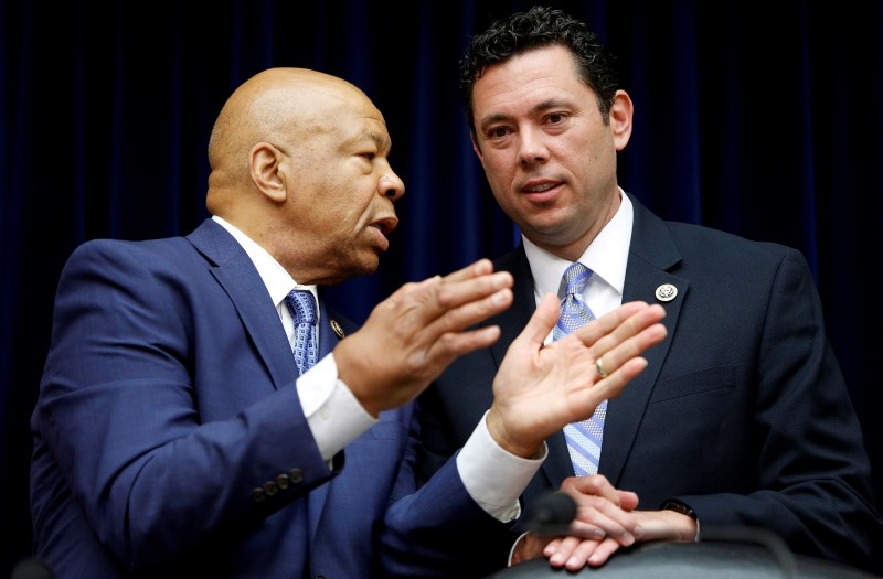 © Reuters. Chairman Chaffetz talks with Elijah Cummings before House Oversight and Government Reform Committee in Washington