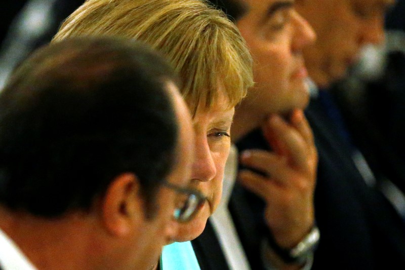 © Reuters. Merkel attends a NATO Summit working dinner at the Presidential Palace in Warsaw