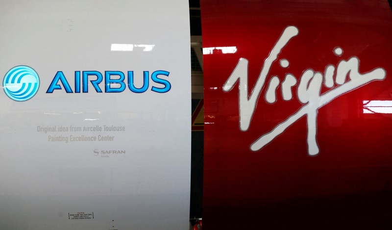 © Reuters. Airbus and Virgin logos are pictured on engines during the delivery of the first series-production LEAP-1A propulsion systems by Aircelle for the A320neo aircraft Airbus family in Colomiers