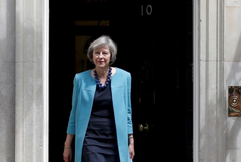 © Reuters. Britain's Home Secretary, Theresa May, leaves after a cabinet meeting in Downing Street in central London