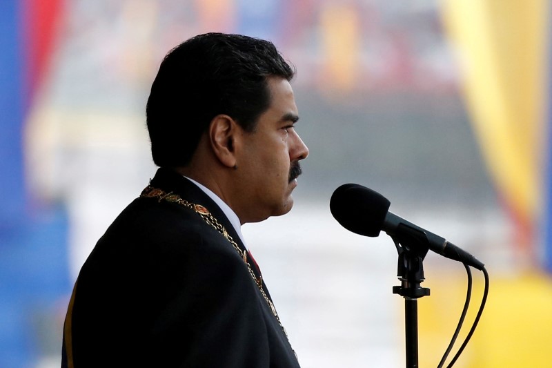 © Reuters. Venezuela's President Maduro attends a military parade to celebrate the 205th anniversary of Venezuela's independence in Caracas