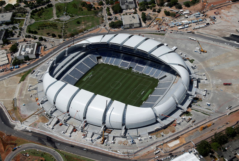 © Reuters. An aerial view shows the Arena das Dunas stadium, which will host matches for the 2014 soccer World Cup, in Natal