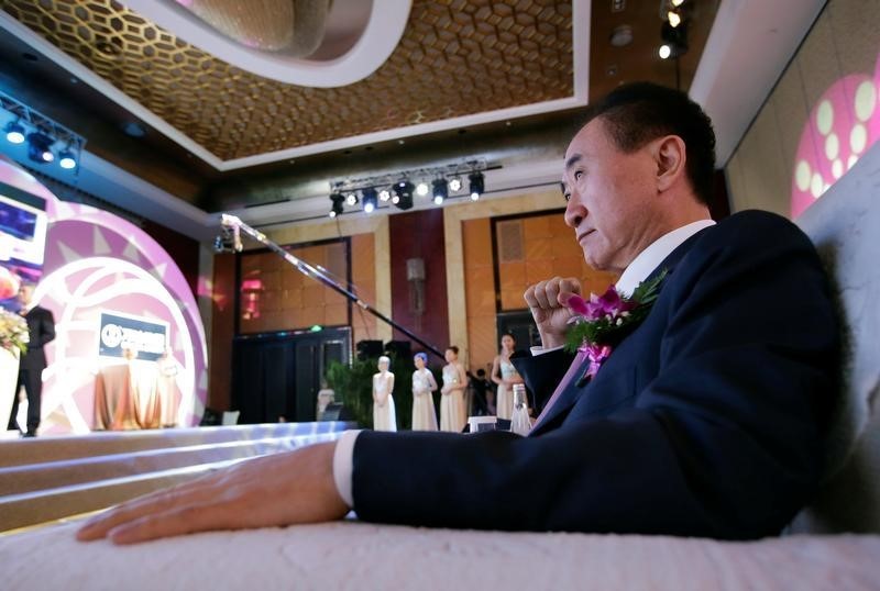 © Reuters. Wang Jianlin, chairman of the Wanda Group, attends a signing ceremony in Beijing