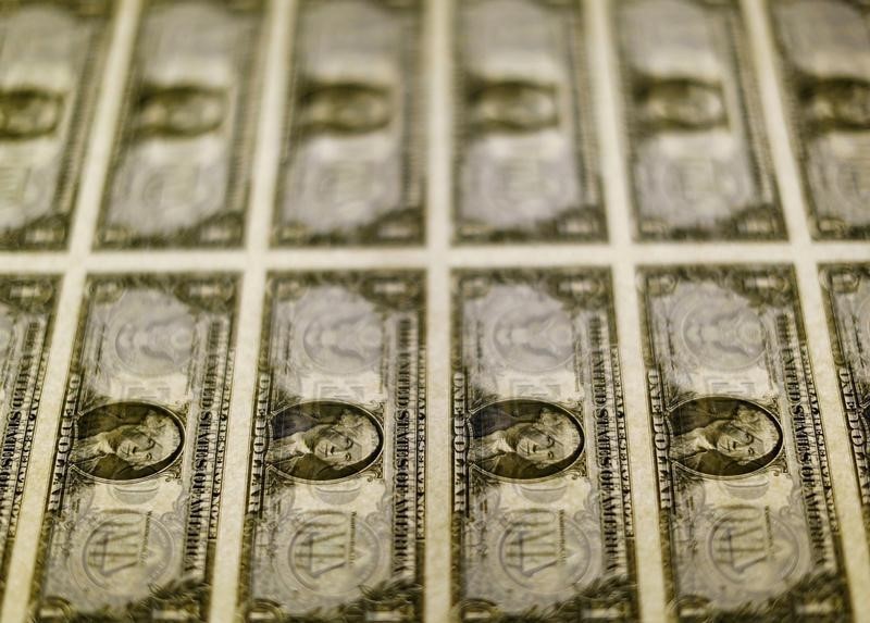 © Reuters. United States one dollar bills seen on a light table at the Bureau of Engraving and Printing in Washington