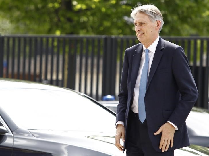 © Reuters. Hammond arrives at the PGE National Stadium, the venue of the NATO Summit, in Warsaw
