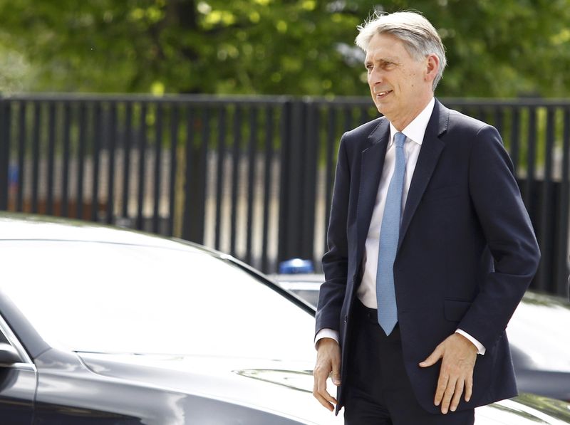 © Reuters. Britain's Foreign Secretary Hammond arrives at the PGE National Stadium, the venue of the NATO Summit, in Warsaw