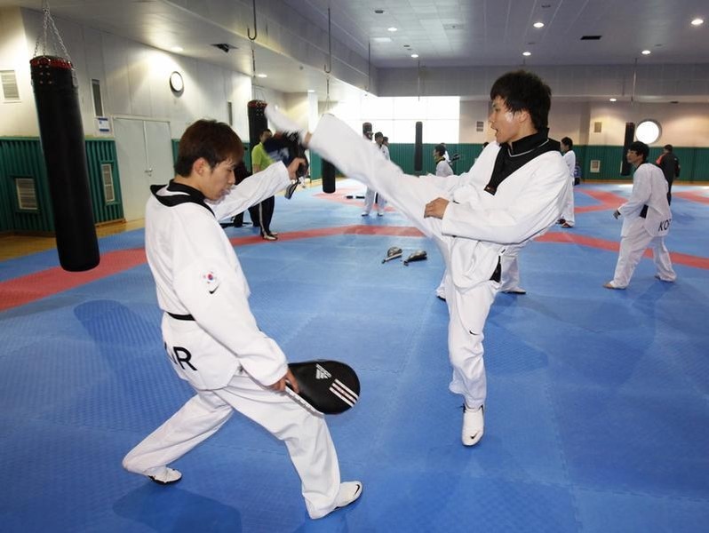 © Reuters. South Korean taekwondo athlete Cha attends training at Taereung National Village in Seoul
