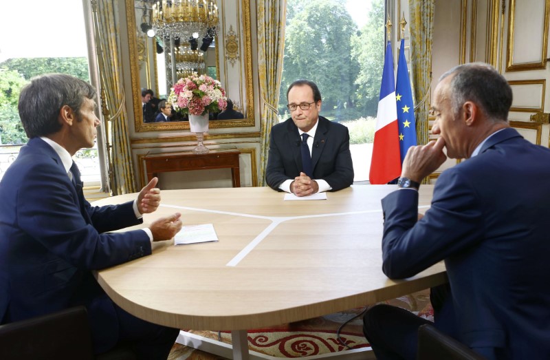 © Reuters. FRANÇOIS HOLLANDE SATISFAIT DE SES CHOIX