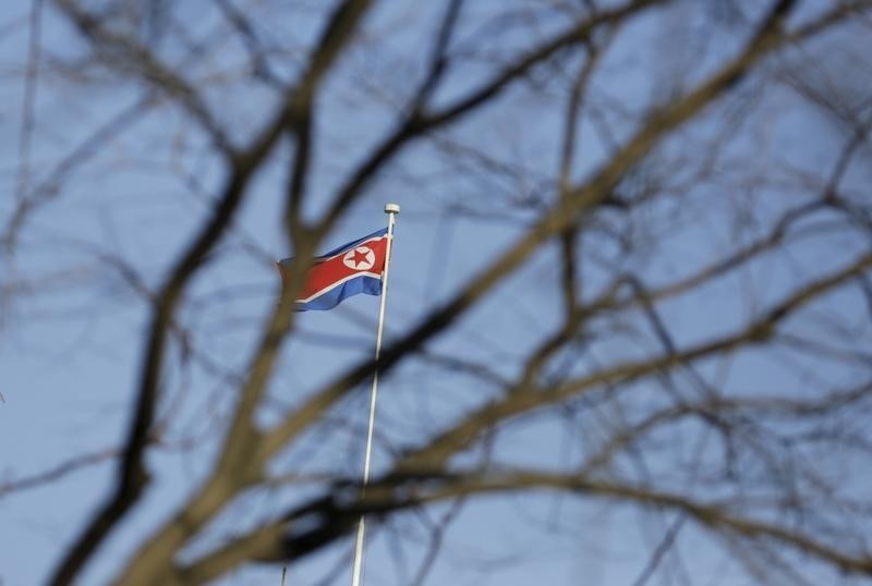 © Reuters. A North Korean flag is seen on the top of its embassy in Beijing